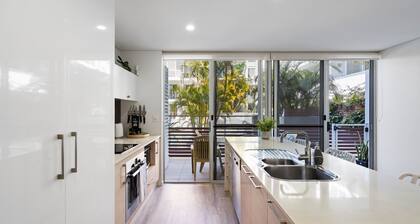Riverside luxury apartment across two levels at Waterline.