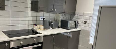 Apartment | Private kitchen | Fridge, microwave, oven, stovetop