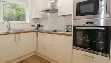 Fridge, electric kettle, toaster, cookware/dishes/utensils