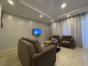 Deluxe Apartment | Living area
