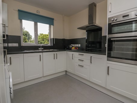 Fridge, electric kettle, toaster, cookware/dishes/utensils