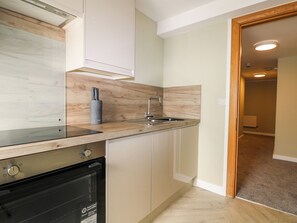 Cottage | Private kitchen | Fridge, electric kettle, toaster, cookware/dishes/utensils - Marine Court Three Bedroom Second-floor Apartment 32 (Littlehampton)
