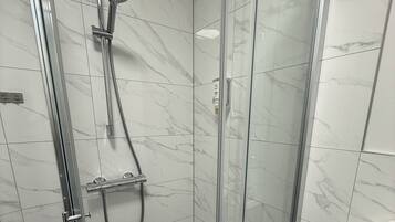 Standard Double Room | Bathroom | Shower, hair dryer, towels, soap