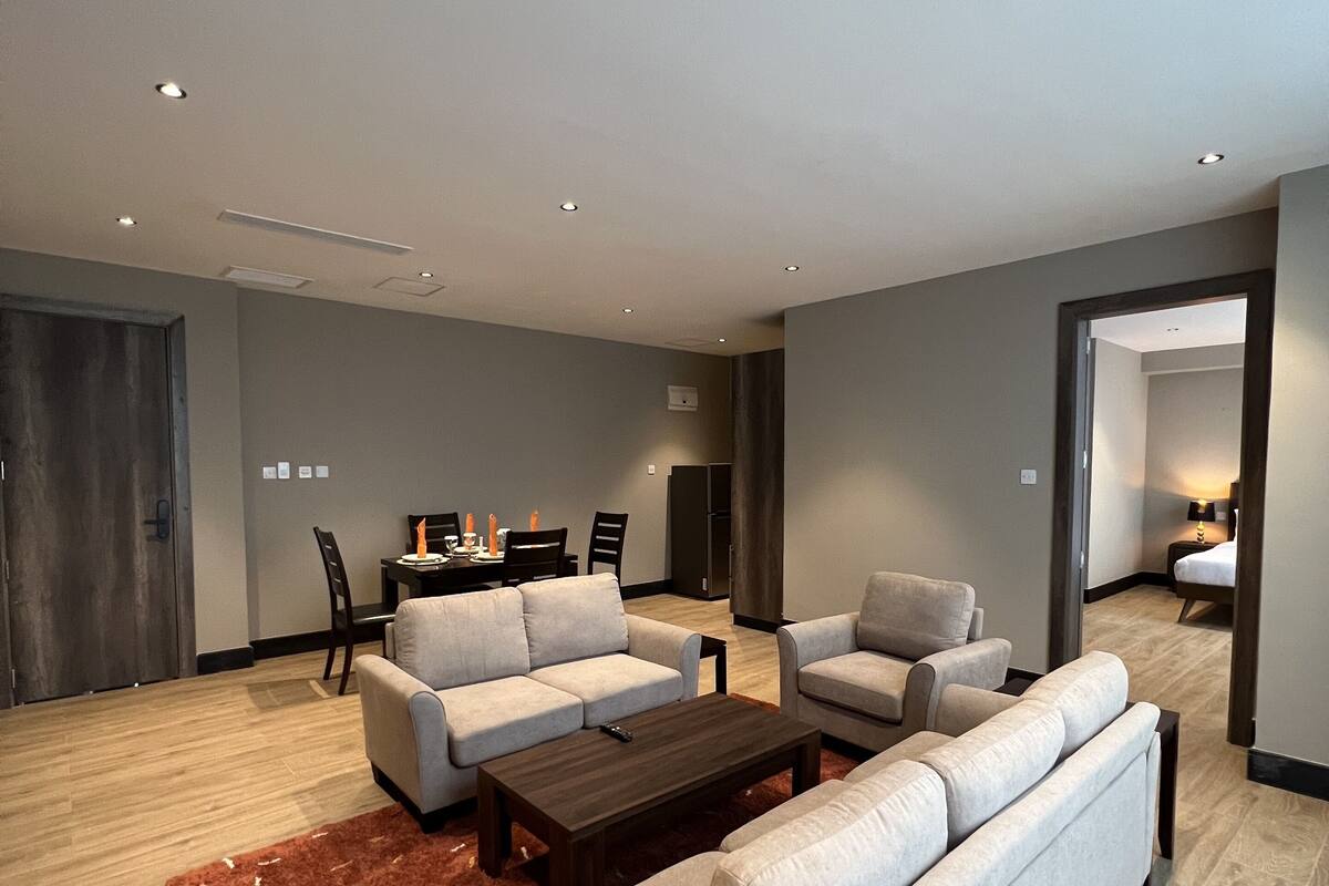 Appartement Standard | Aire de séjour | Téléviseur à écran plat