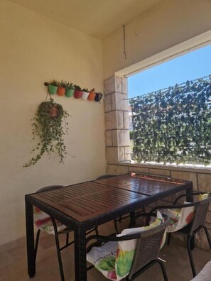 Apartment (A1) | Outdoor dining - Apartments Postira uz More (Postira)