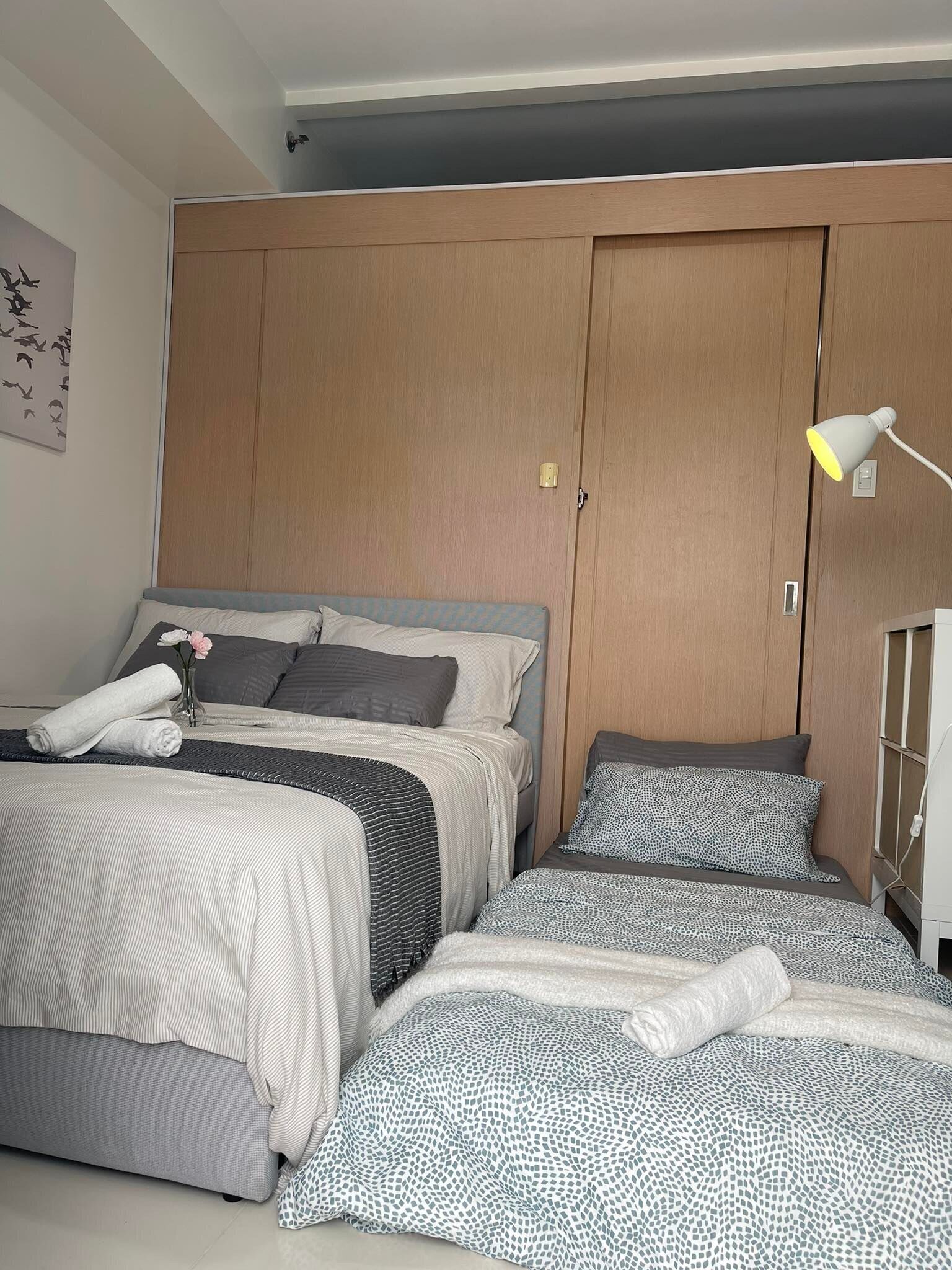 1 BR Cozy Modern Condo Balcony at Wind Residences