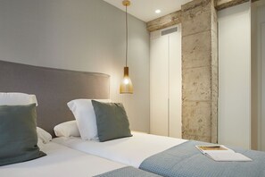 3 slaapkamers, een strijkplank/strijkijzer, beddengoed