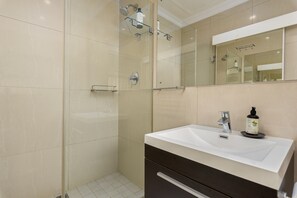 Shower, hair dryer, towels, soap