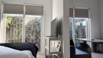 1 bedroom, desk, blackout curtains, iron/ironing board