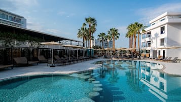 Outdoor pool, open 10:00 AM to 7:00 PM, pool umbrellas, sun loungers