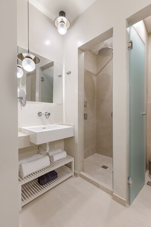 Shower, hair dryer, bathrobes, towels