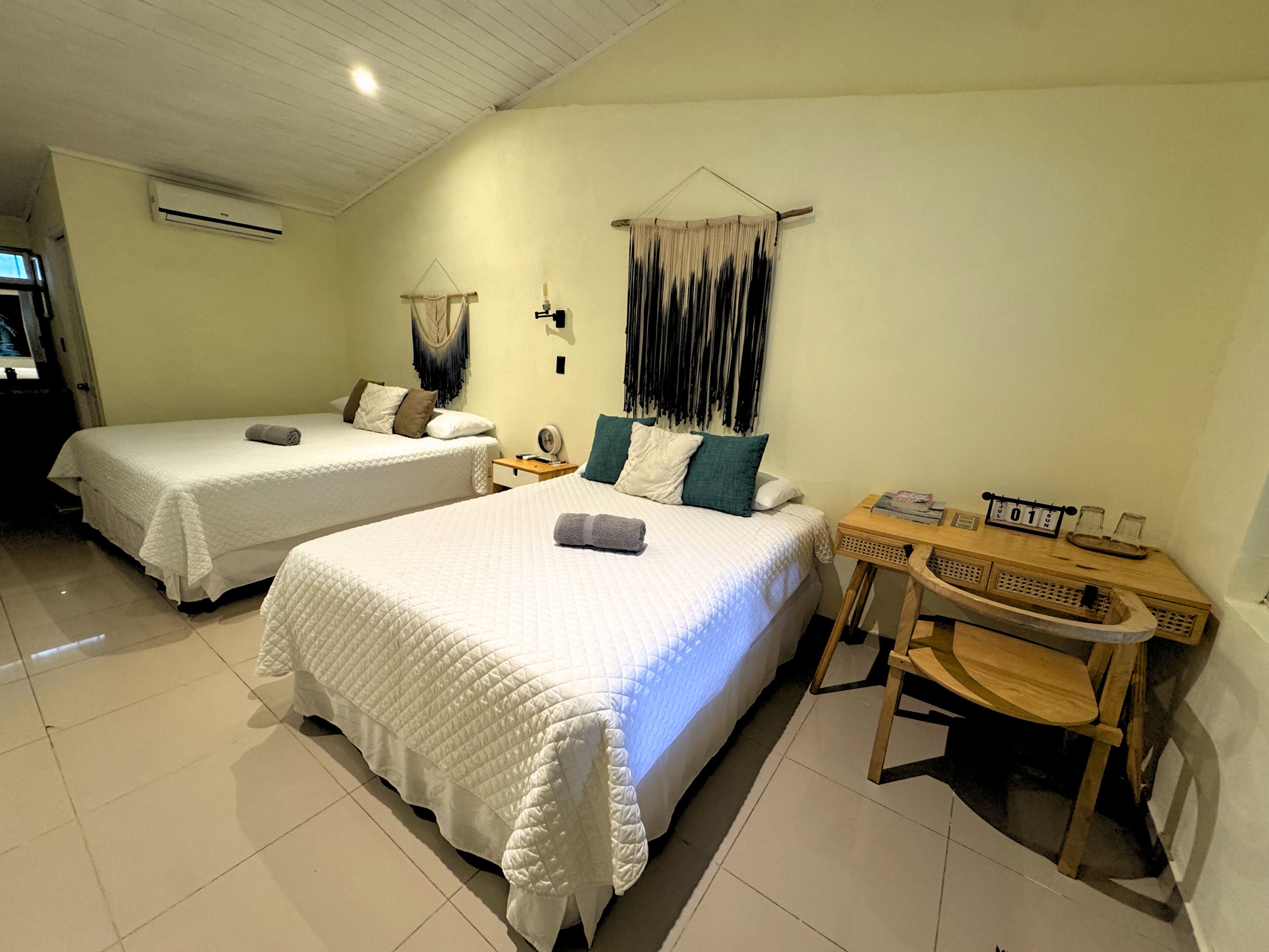 Premium bedding, down comforters, pillowtop beds, in-room safe