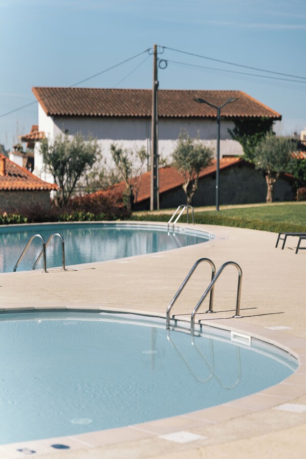 2 outdoor pools, pool umbrellas, sun loungers