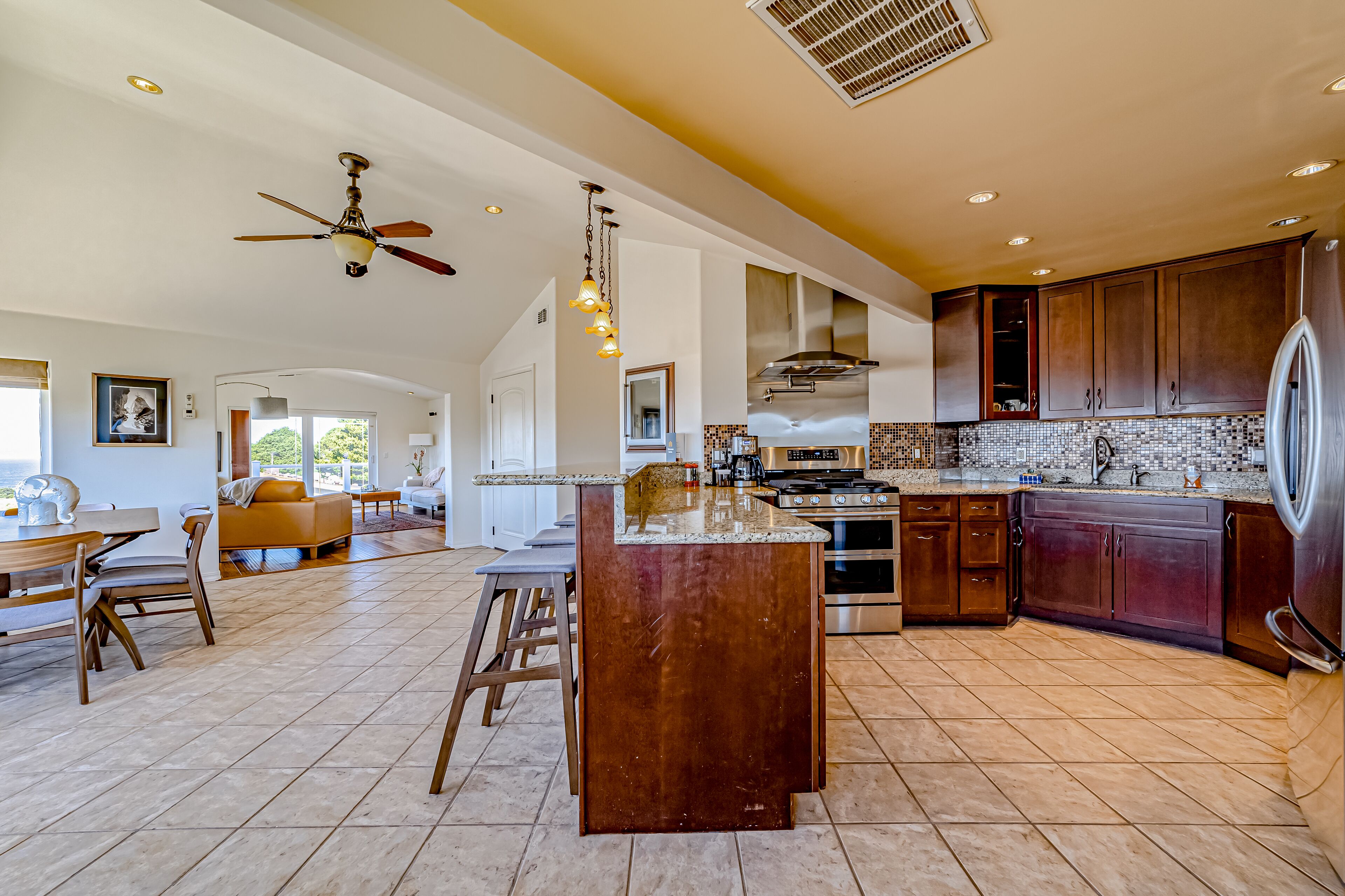 Ocean- & river-view home with EV charger, deck, & central AC - walk to beach