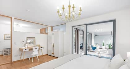 Two-room apartment in the city center with underground parking space