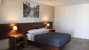 デラックス スタジオスイート | 低刺激性寝具、WiFi (無料)、ベッドシーツ