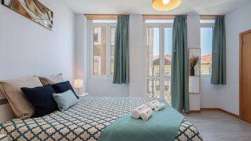 2 habitaciones, tabla de planchar con plancha, cuna de viaje y wifi