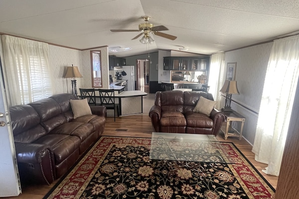 Living Room seats minimum of 5 comfortably with 4 recliners!