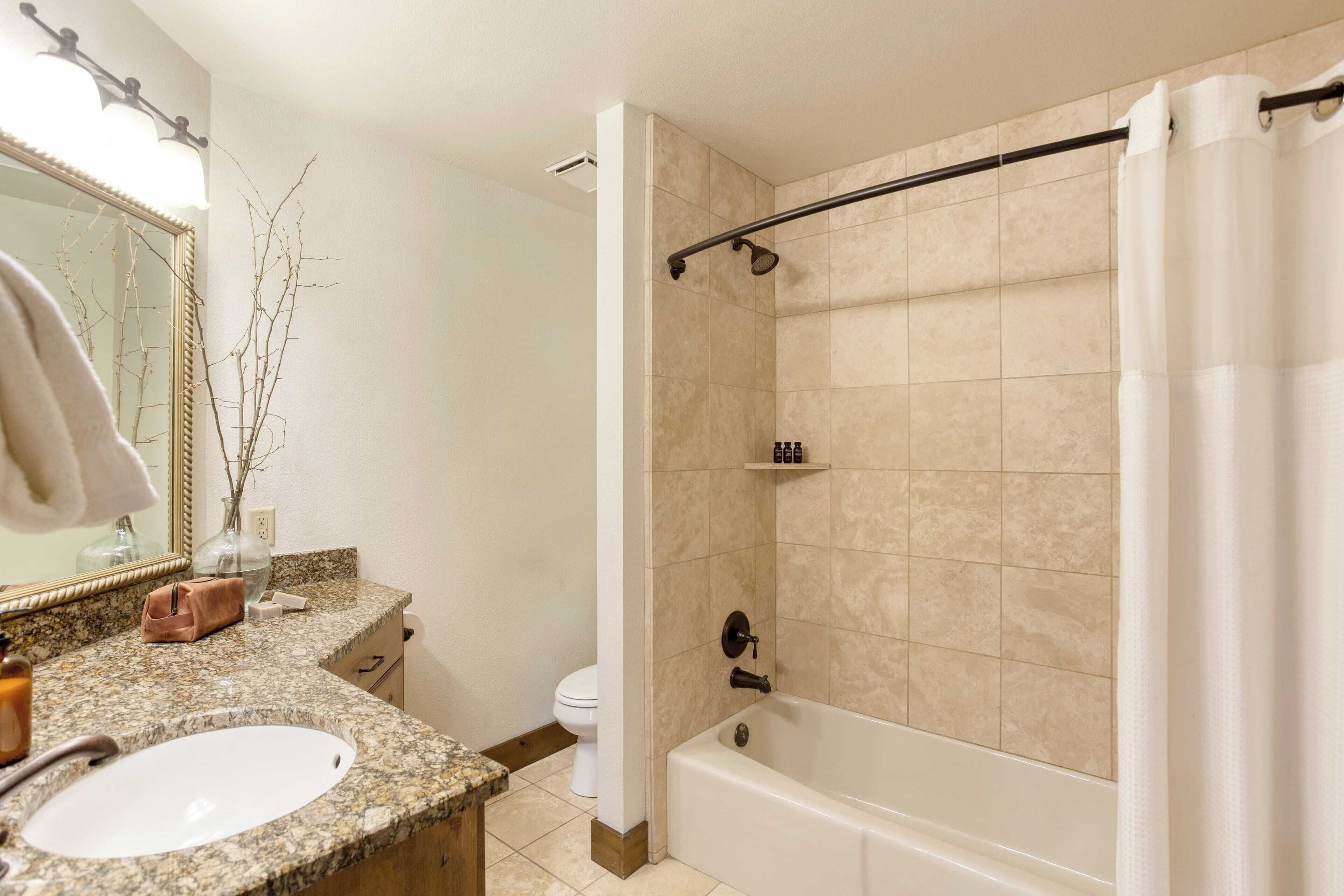 Bathtub, free toiletries, towels, soap