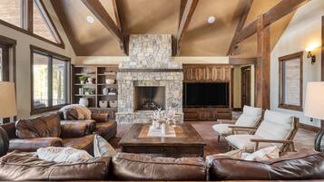 55-inch TV with digital channels, fireplace, streaming services