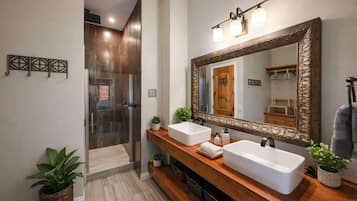 Bathtub, hair dryer, towels, shampoo