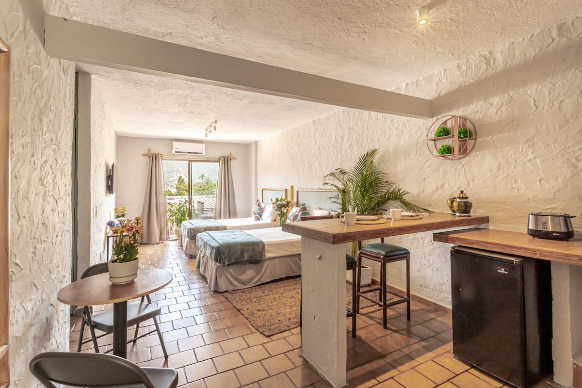 Desk, laptop workspace, free WiFi, bed sheets