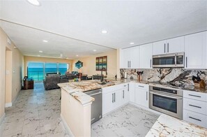 Fridge, microwave, oven, stovetop - Panoramic Gulf Views At Ocean Sands In Madeira Beach~ Os502 (Madeira Beach)