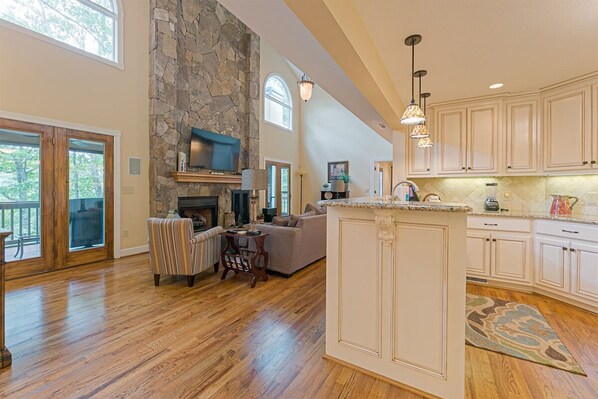Main Level Living Room with Gas Fireplace & Smart TV