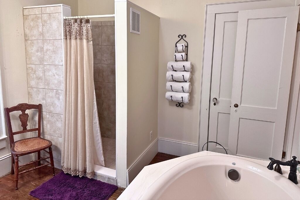 Bathtub, jetted tub, towels, soap