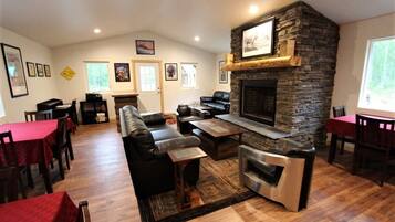 TV, fireplace, books