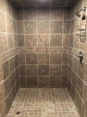 Combined shower/tub, jetted tub