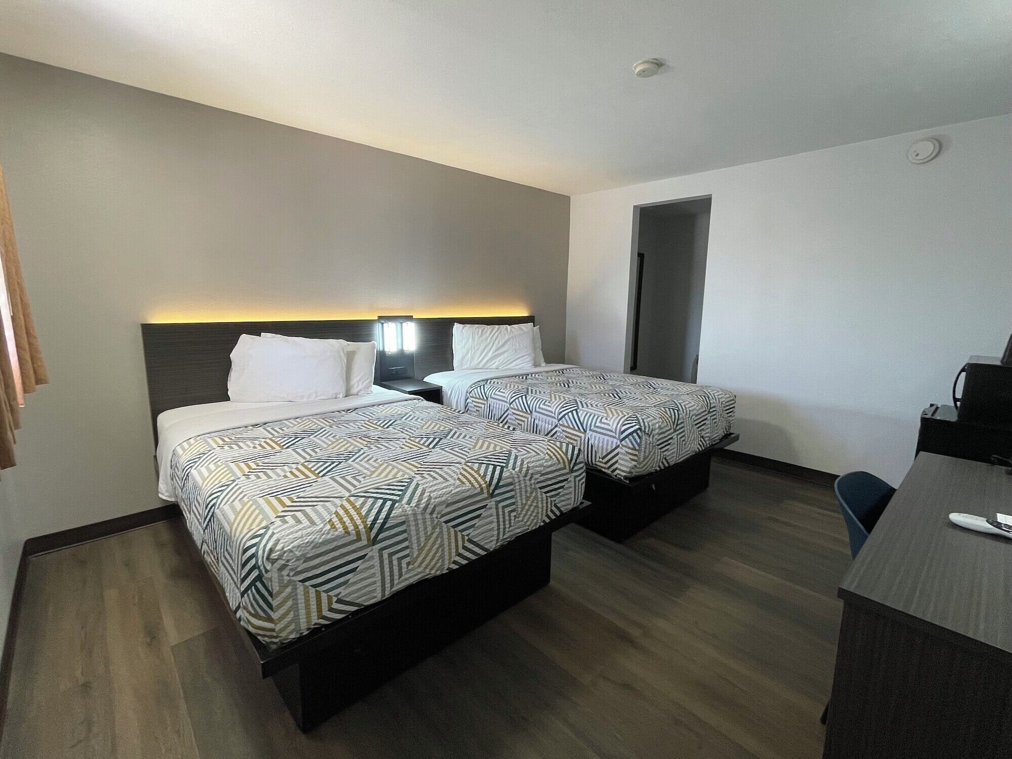 Blackout drapes, free WiFi, bed sheets