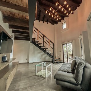 Panoramic Loft | Living area | 40-inch Smart TV with digital channels, TV