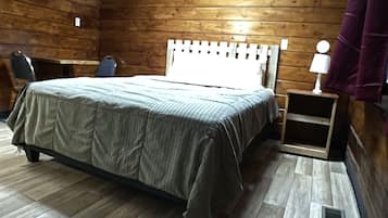 Desk, blackout curtains, bed sheets