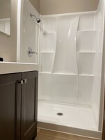 Traditional Room | Bathroom | Shower, rainfall showerhead, towels
