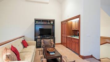 55-inch TV with digital channels, fireplace, streaming services