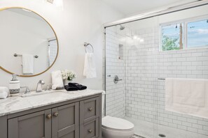 Shower, hair dryer, towels, soap