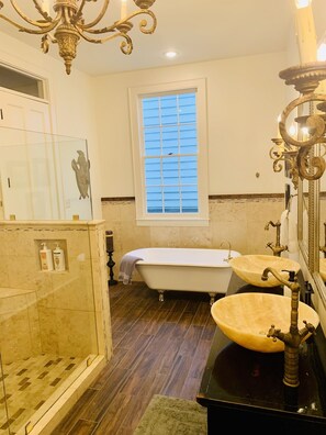 Bathtub, hair dryer, towels, soap
