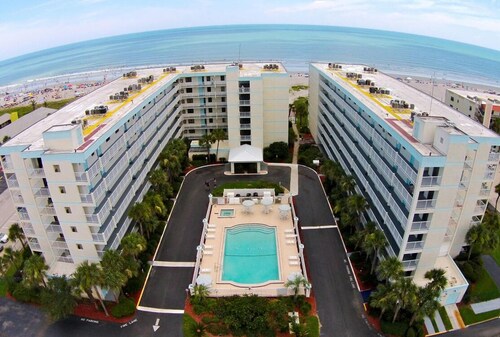 Relax and Unwind Ocean-View Condo Step to the Beach with Heated pool and Tennis Court