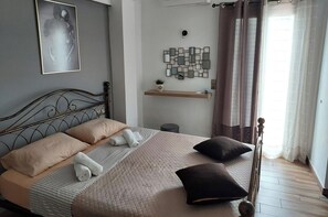 1 غرفة نوم ومكواة/لوح كي وواي فاي وملاءات أسرّة