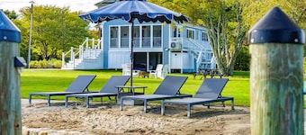 Stunning waterfront home with big yard & dock! Voted #1 rental in all of RI!
