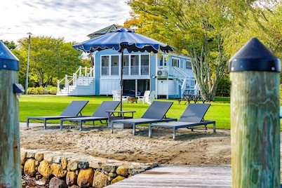 Stunning waterfront home with big yard & dock! Voted #1 rental in all of RI!