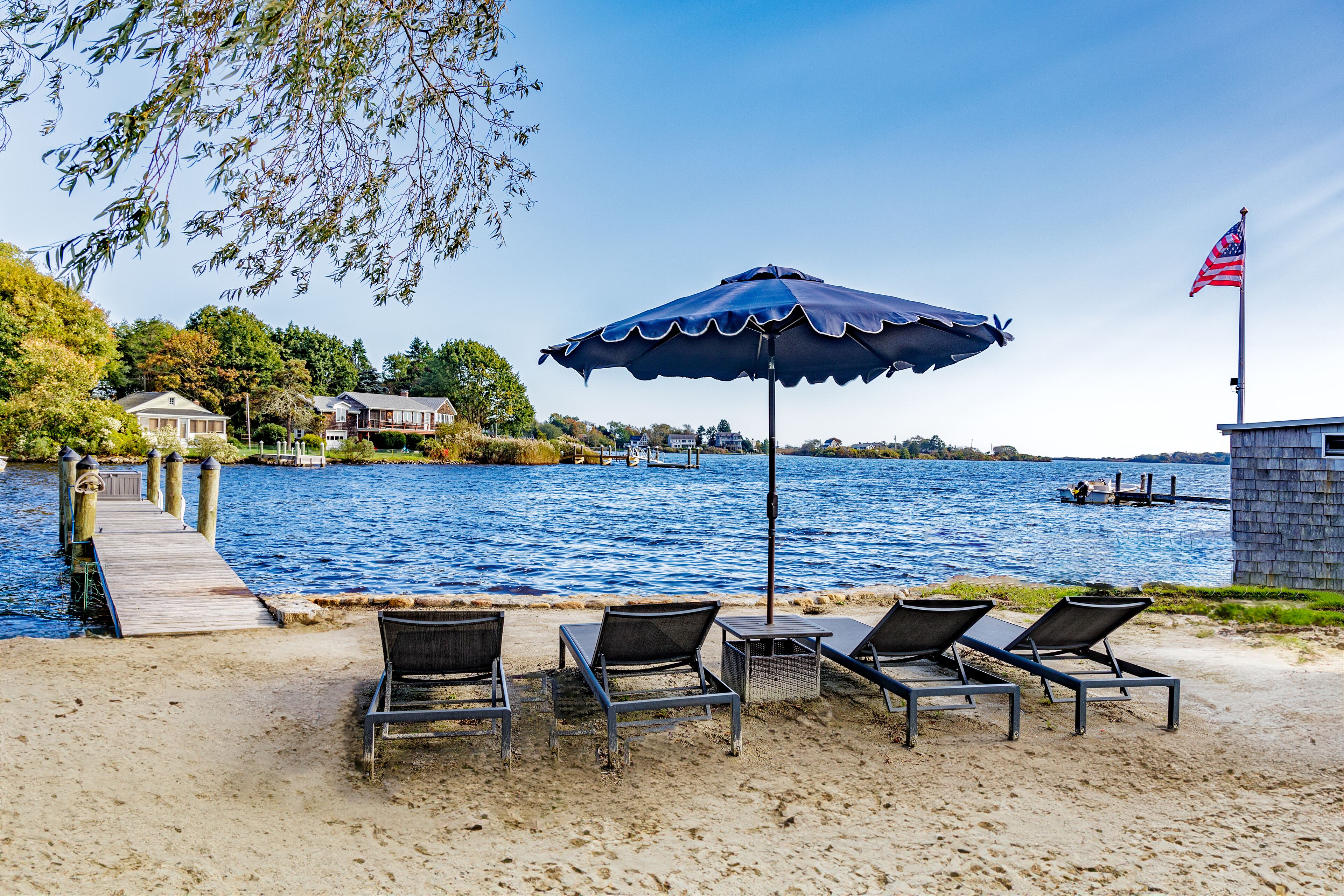 Stunning waterfront home with big yard & private dock!