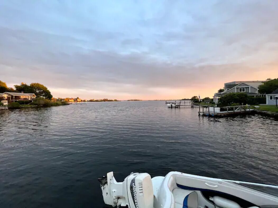 Stunning waterfront home with big yard & private dock!