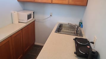 Fridge, microwave, coffee/tea maker, electric kettle