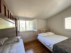 2 dormitorios, tabla de planchar con plancha, wifi gratis y ropa de cama