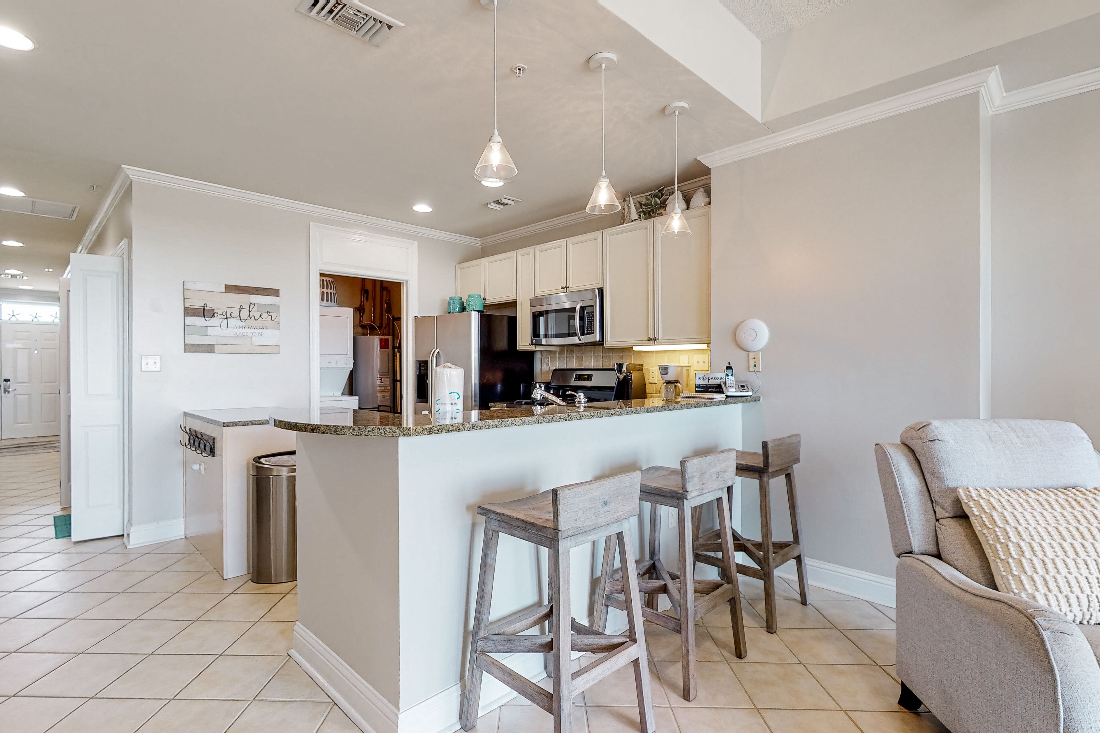 Water-view condo with balcony, pool, hot tub, gym, dining, & shops