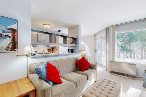 Charming mountainside condo with fireplace, skiing, balcony, & washer/dryer