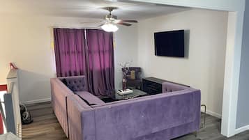 Comfort Room | Living area | 55-inch TV with digital channels