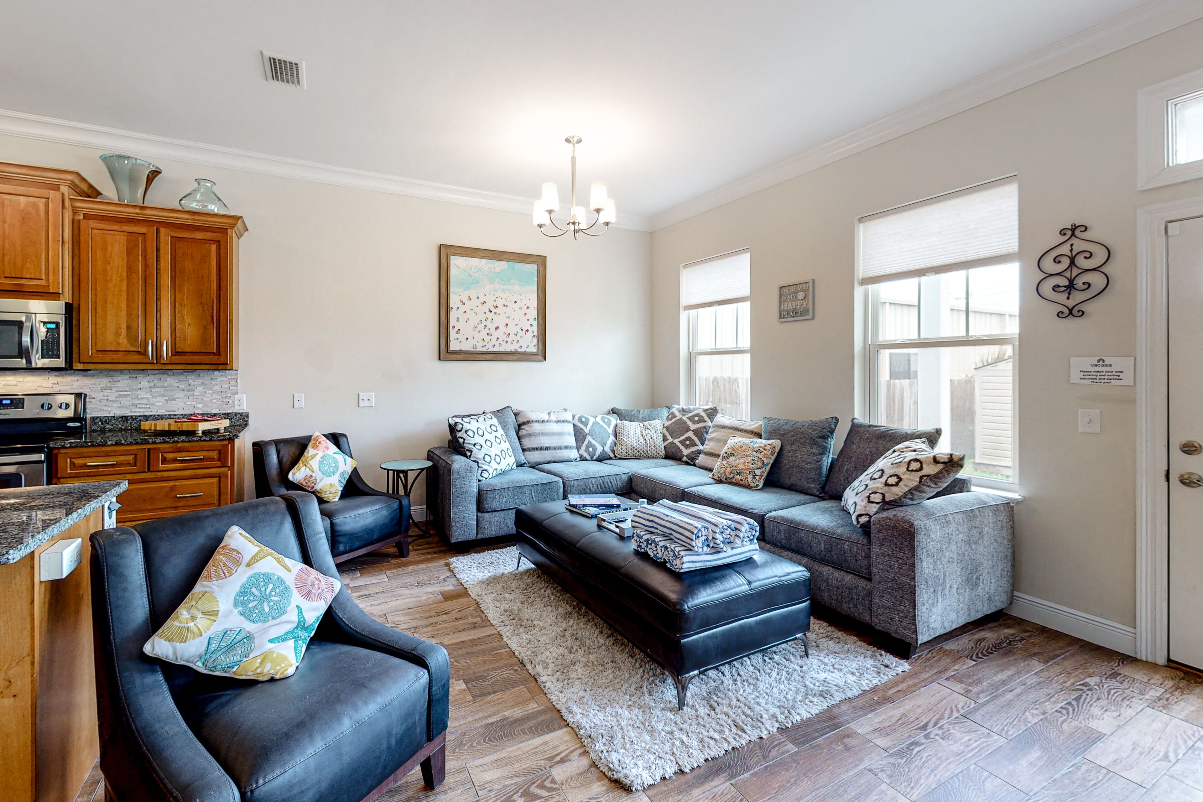 Dog-friendly beach house with balcony, fenced yard, & AC - walk to beach